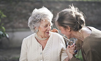 grandmother talking with her daughter
