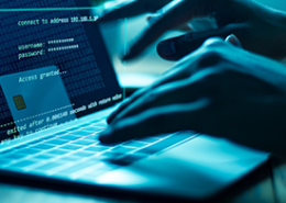 close up of hands on laptop keyboard