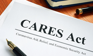 Paper-with-Cares-act-printed-on-it