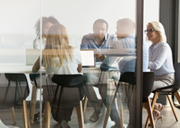 Looking-into-conference-room-meeting-through-glass