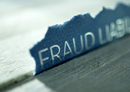 torn-paper-with-words-fraud liability
