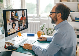 man-in-home-office-on-video-call