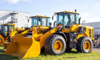 line-up-of-yellow-construction-tractors