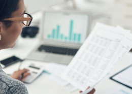 woman-reading-accounting-files